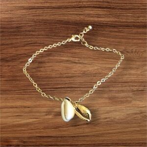 Gold Tone 8-9" Adjustable Bracelet with 2 Shell Charms